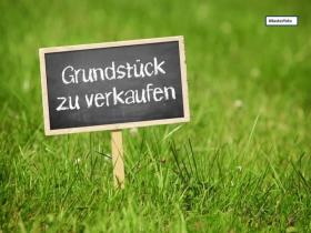 Grundstück_mit_Verkaufsschild_Musterfoto - Grundstücke Zwangsversteigerungen in Hasselberg, Deutschland