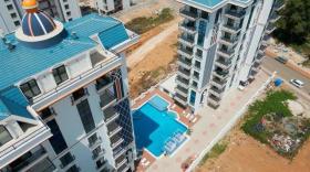 Διαμερίσματα προς πώληση στο Αδαλία-Üçgen Mahallesi, Τουρκία